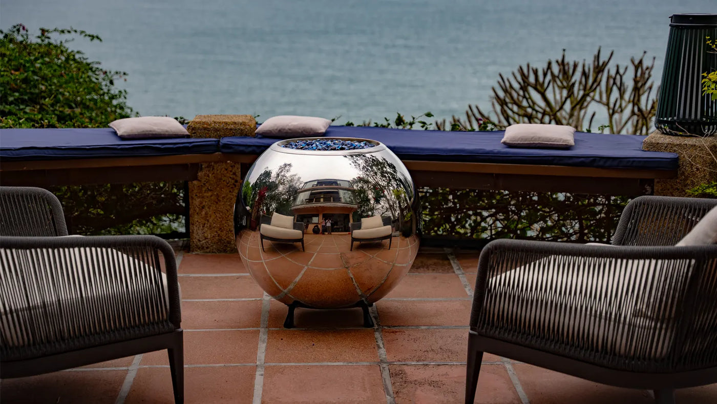 Ballo Stainless Steel Fireplace on a Patio